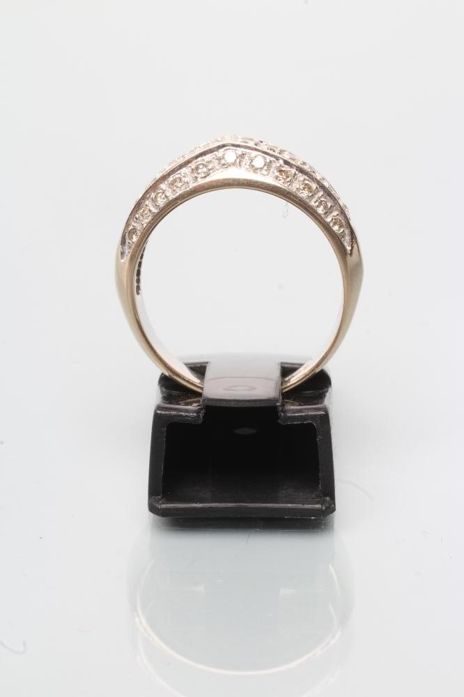 A DIAMOND HALF HOOP RING Image