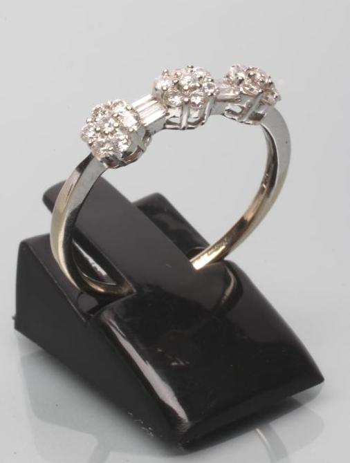 A DIAMOND TRIPLE CLUSTER RING Image