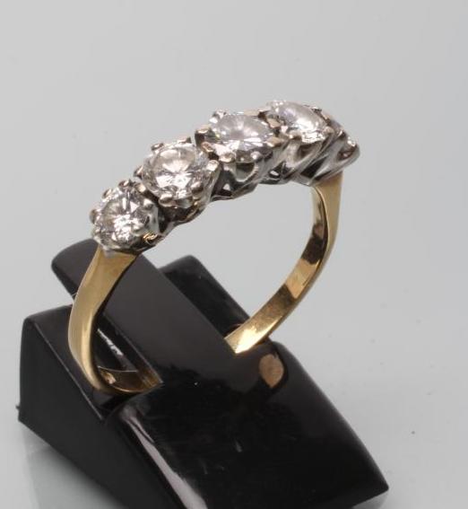 A FIVE STONE DIAMOND RING Image