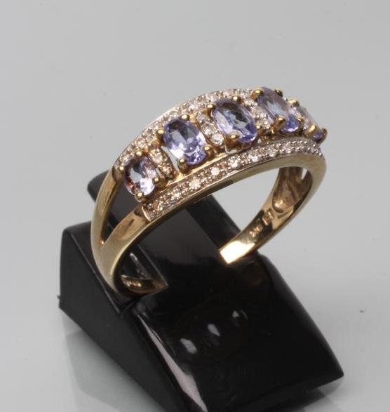 A TANZANITE AND DIAMOND DRESS RING Image
