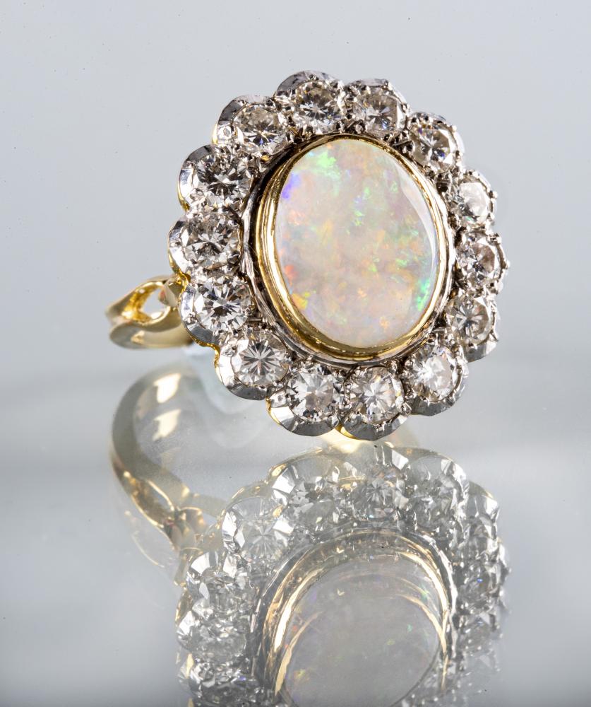 AN OPAL AND DIAMOND CLUSTER DRESS RING Image