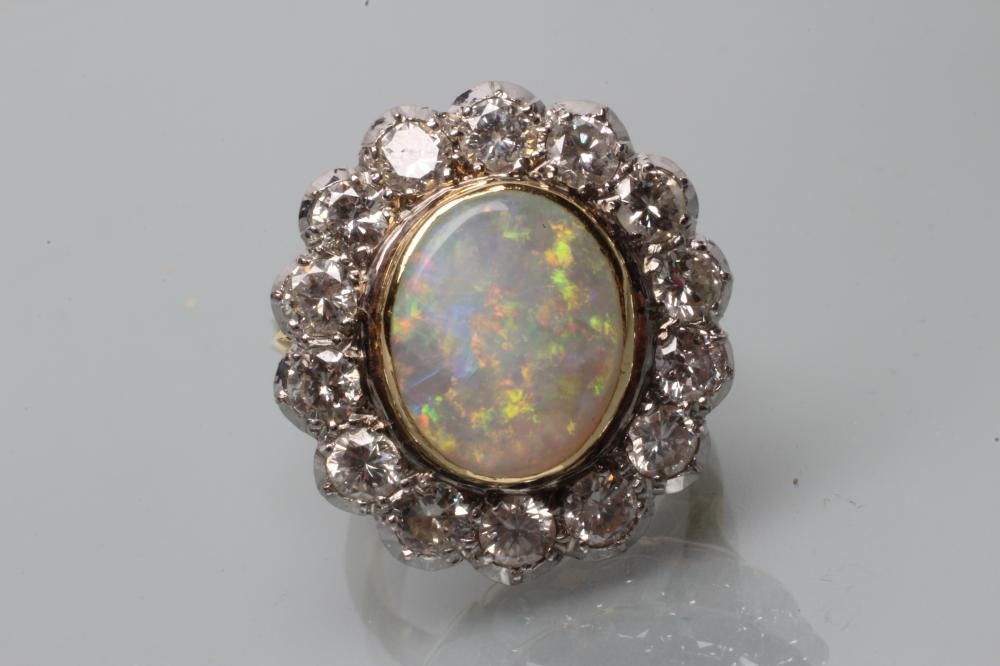 AN OPAL AND DIAMOND CLUSTER DRESS RING Image