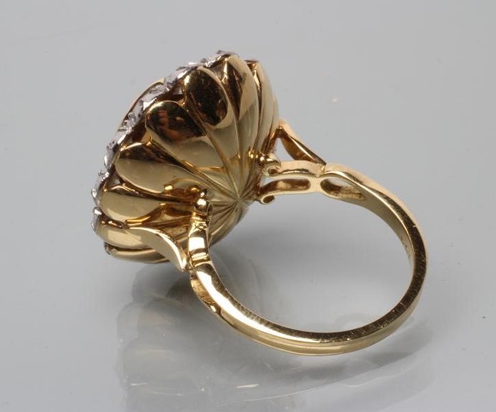 AN OPAL AND DIAMOND CLUSTER DRESS RING Image