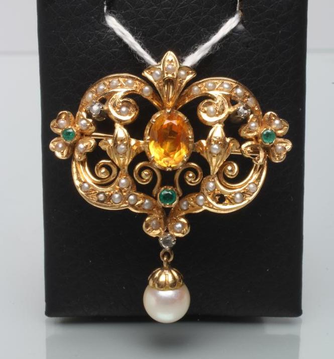 A MULTI-GEM SET 18CT GOLD RENAISSANCE STYLE BROOCH/PENDANT of open cartouche form Image