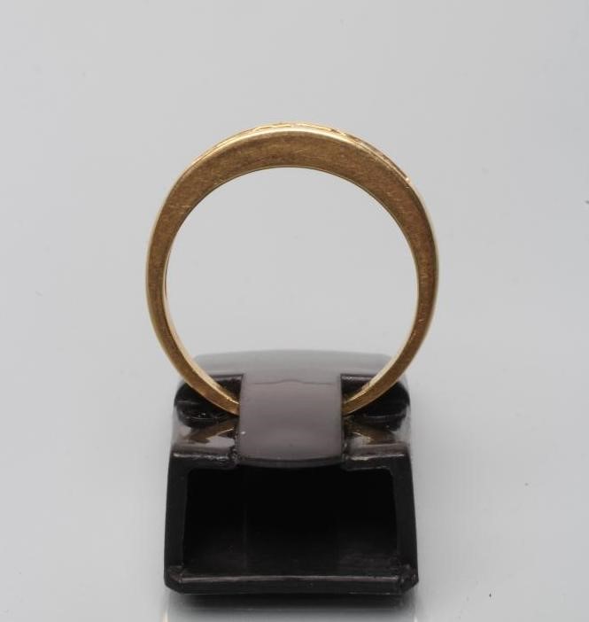 A SEVEN STONE DIAMOND HALF HOOP ETERNITY RING Image