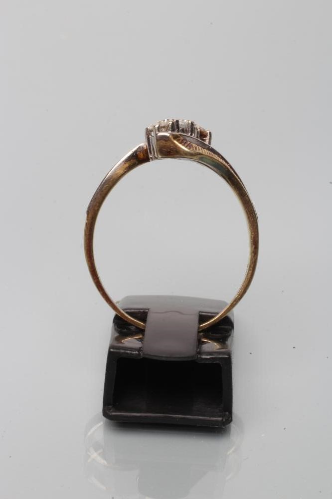 A THREE STONE DIAMOND RING Image