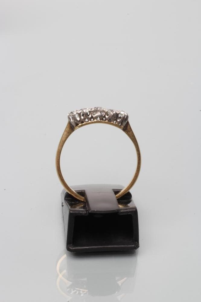 A FIVE STONE DIAMOND RING Image
