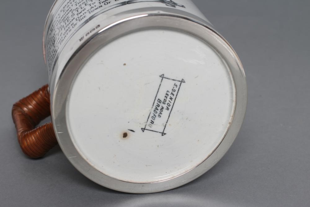 OF LOCAL LEEDS INTEREST - an Edwardian silver mounted earthenware mug of plain cylindrical form with Image
