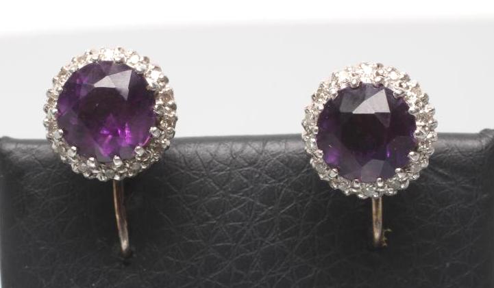 A PAIR OF AMETHYST AND DIAMOND CLUSTER EARRINGS Image