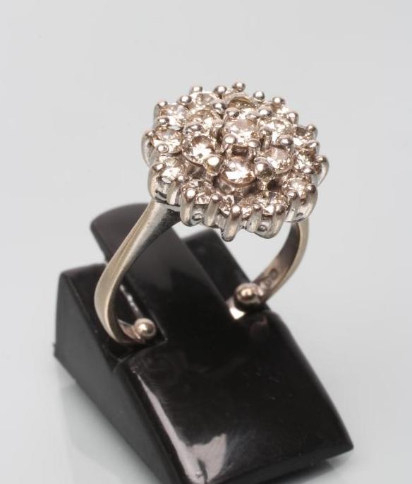 A DIAMOND CLUSTER RING Image