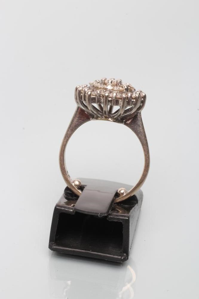 A DIAMOND CLUSTER RING Image