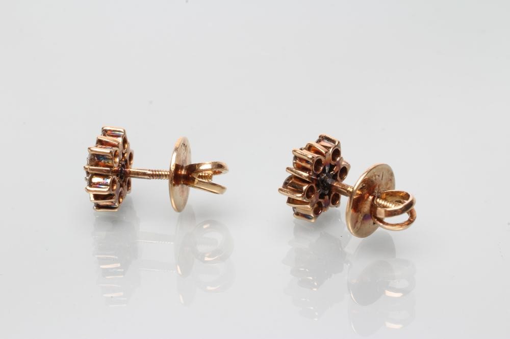 A PAIR OF DIAMOND CLUSTER EAR STUDS Image