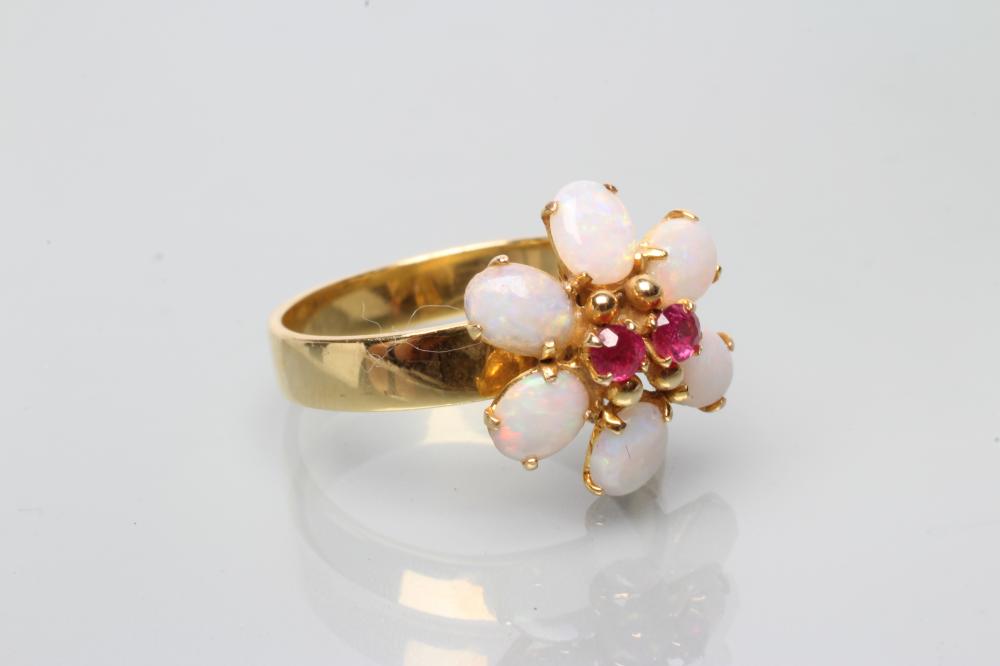 A RUBY AND OPAL CLUSTER FLOWER RING Image