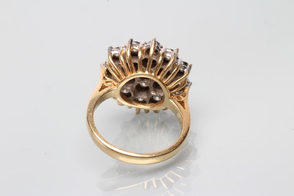 A DIAMOND CLUSTER RING Image