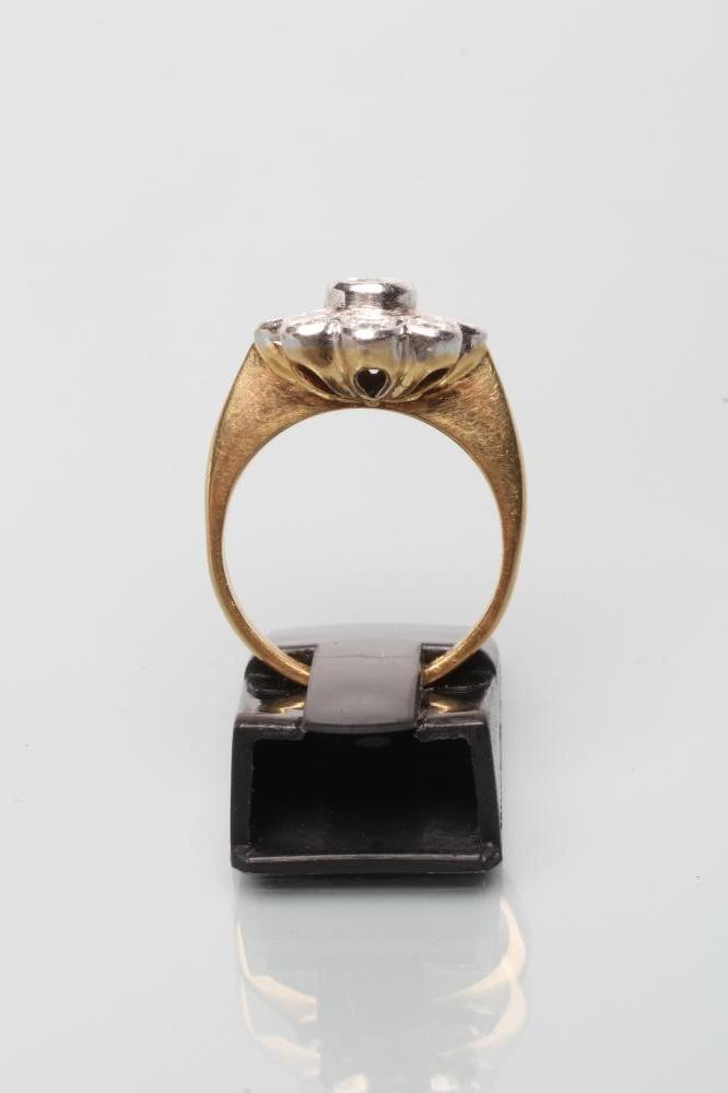 A DIAMOND CLUSTER RING Image