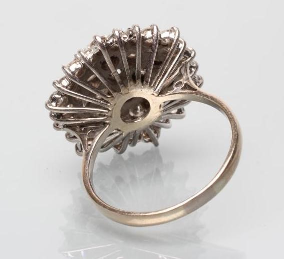 A DIAMOND CLUSTER DOMED COCKTAIL RING Image