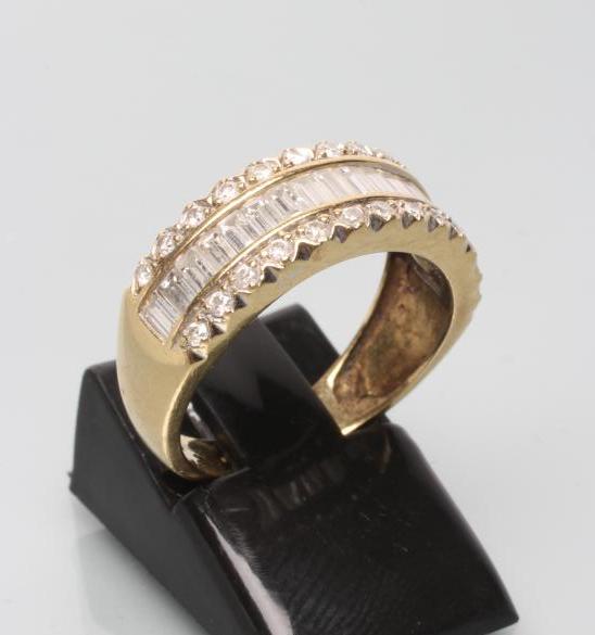 A DIAMOND HALF HOOP ETERNITY RING Image