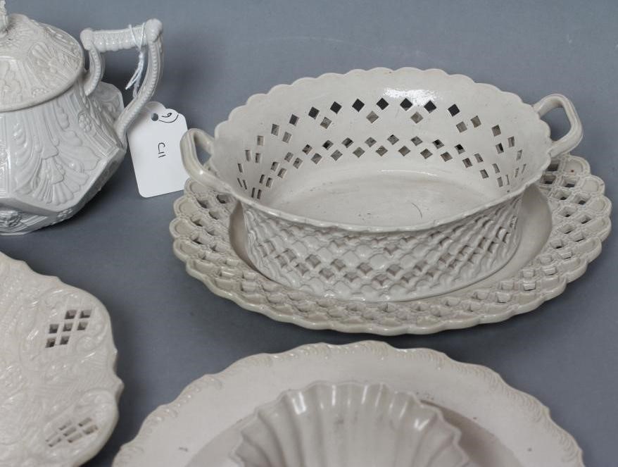A COLLECTION OF STAFFORDSHIRE WHITE SALTGLAZE STONEWARE Image