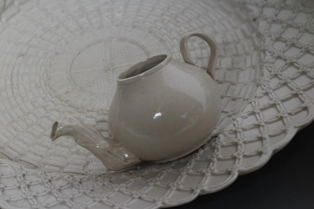 A COLLECTION OF STAFFORDSHIRE WHITE SALTGLAZE STONEWARE Image