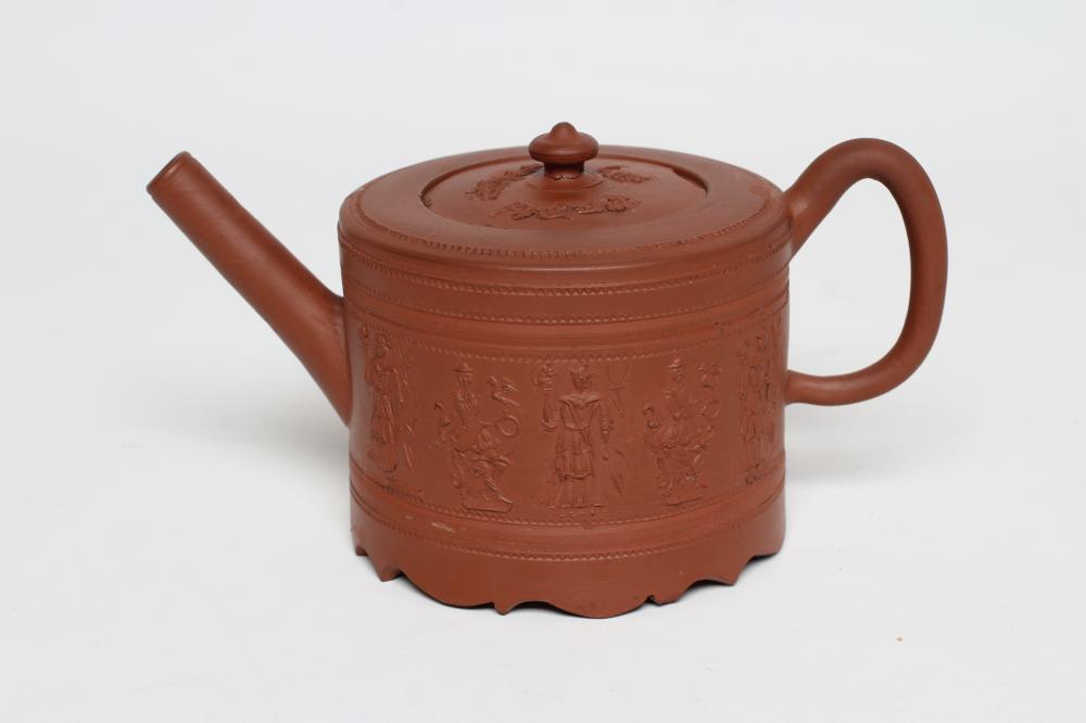 AN ENGLISH REDWARE TEAPOT AND COVER Image