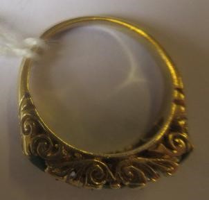 A FIVE STONE EMERALD AND DIAMOND HALF HOOP RING Image