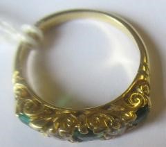 A FIVE STONE EMERALD AND DIAMOND HALF HOOP RING Image