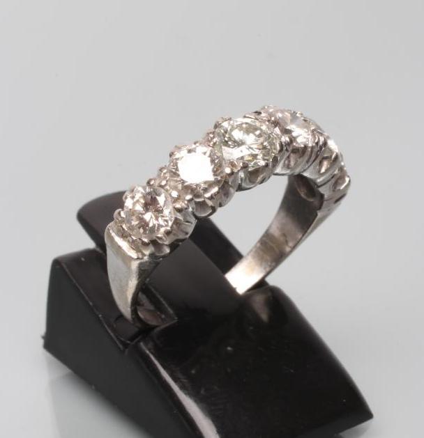 A SIX STONE DIAMOND HALF HOOP ETERNITY RING Image