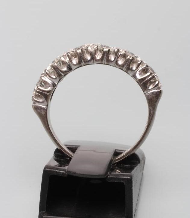A SIX STONE DIAMOND HALF HOOP ETERNITY RING Image