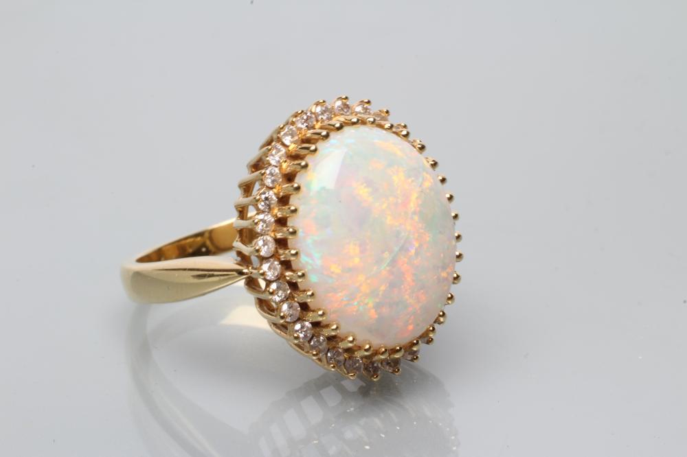 AN OPAL AND DIAMOND CLUSTER DRESS RING Image