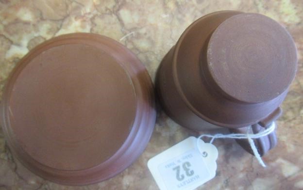 AN ELERS TYPE REDWARE CAPPUCINE AND SAUCER Image