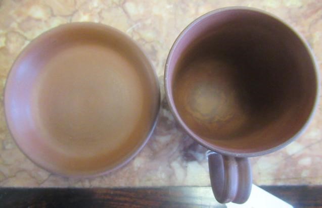 AN ELERS TYPE REDWARE CAPPUCINE AND SAUCER Image