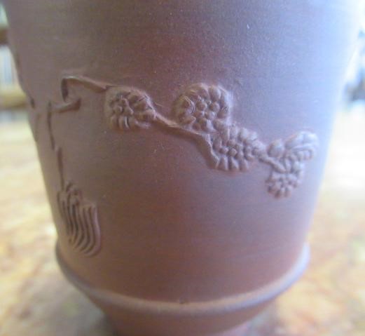 AN ELERS TYPE REDWARE CAPPUCINE AND SAUCER Image