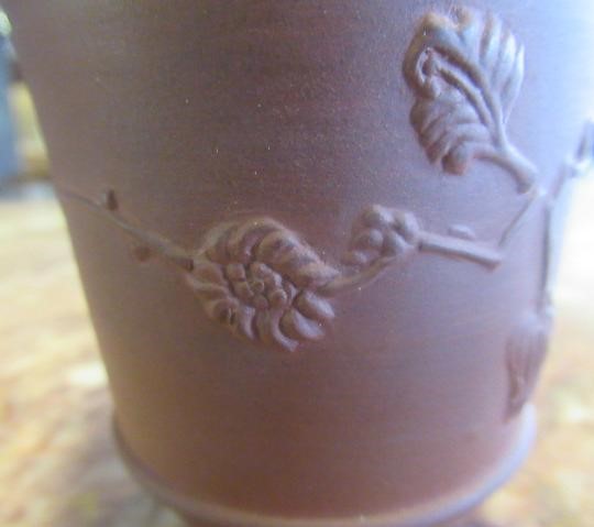 AN ELERS TYPE REDWARE CAPPUCINE AND SAUCER Image