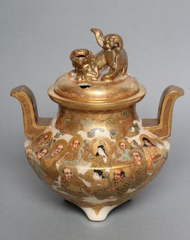 A SATSUMA EARTHENWARE KORO AND COVER of squat baluster form with two solid angular handles Image