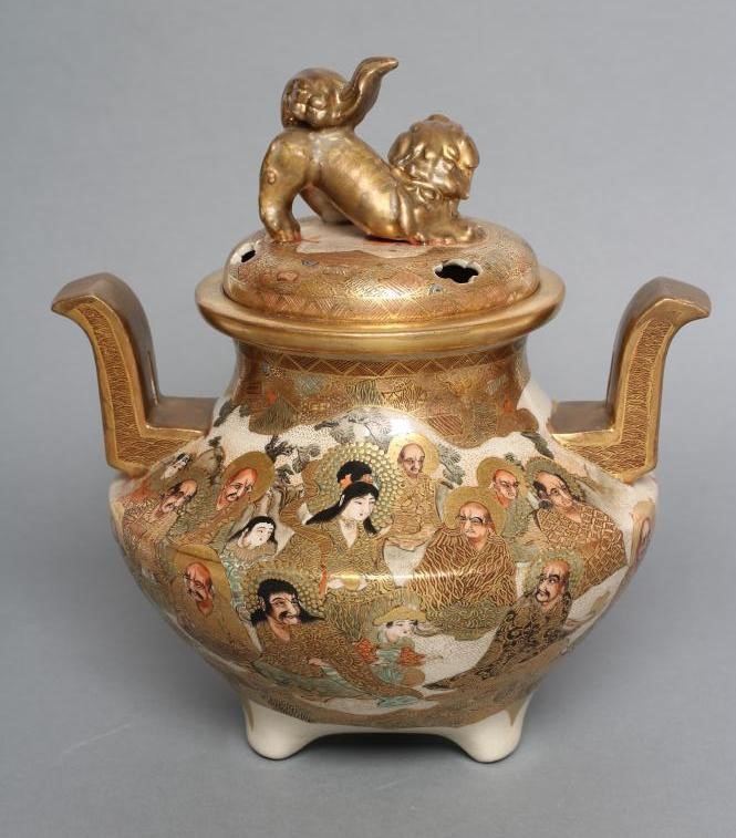 A SATSUMA EARTHENWARE KORO AND COVER of squat baluster form with two solid angular handles Image