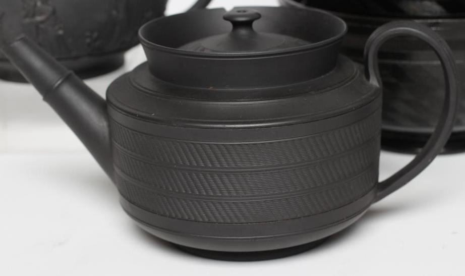 A COLLECTION OF STAFFORDSHIRE DRY BODIED STONEWARES Image