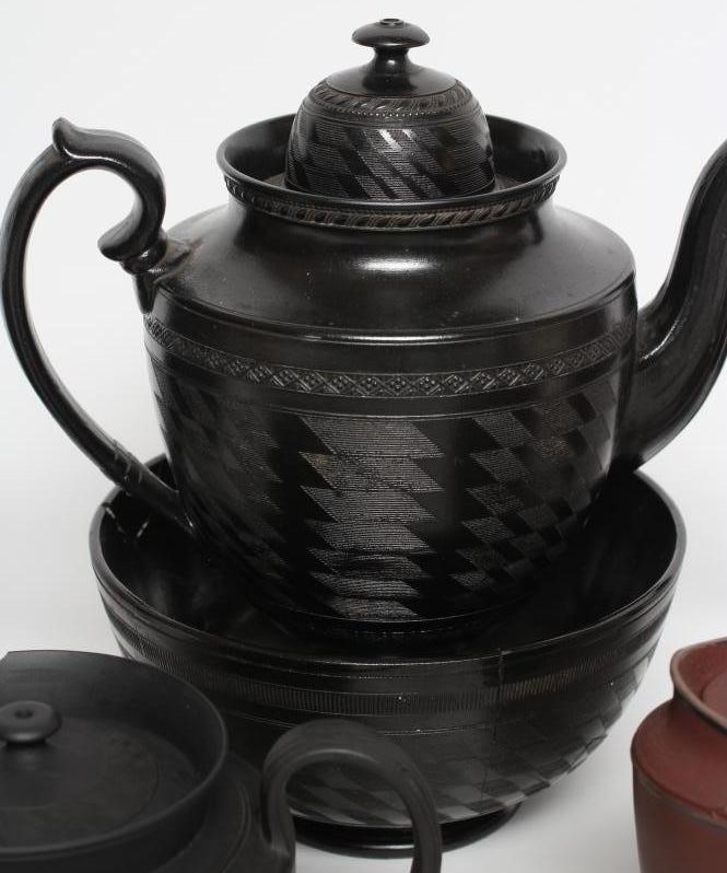 A COLLECTION OF STAFFORDSHIRE DRY BODIED STONEWARES Image