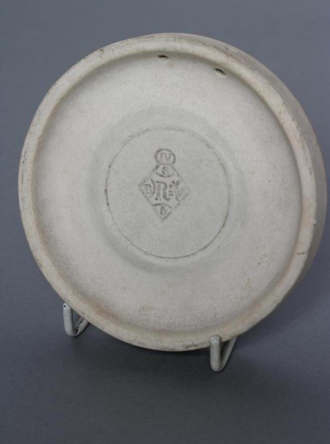 A VICTORIAN DRY BODIED ROUNDEL centrally applied with a bust portrait of Wesley on a blue ground Image