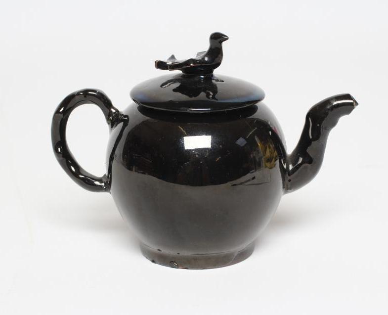 A JACKFIELD BLACK TYPE SMALL TEAPOT AND COVER Image