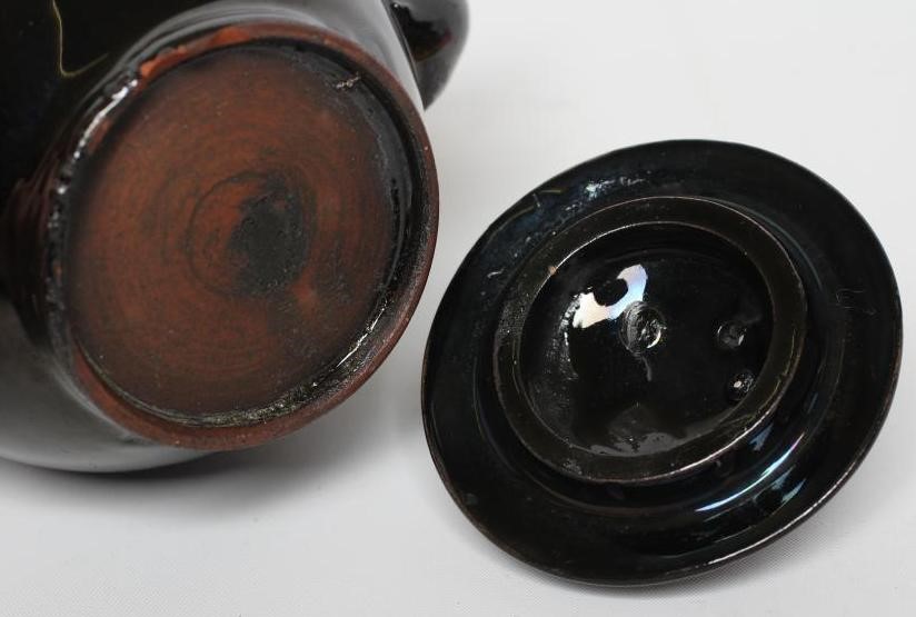 A JACKFIELD BLACK TYPE SMALL TEAPOT AND COVER Image