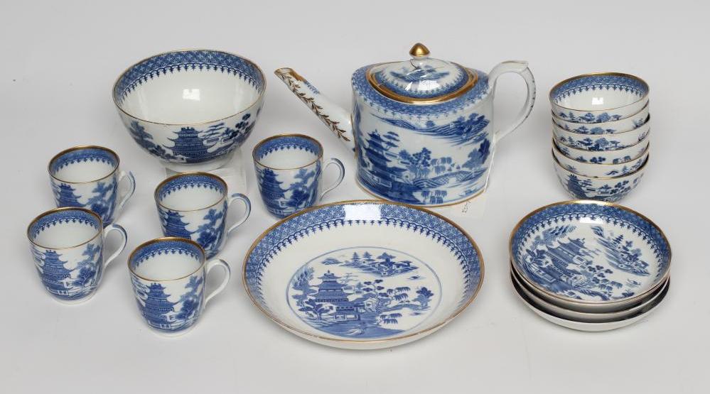 AN ENGLISH PORCELAIN PART TEA AND COFFEE SERVICE Image