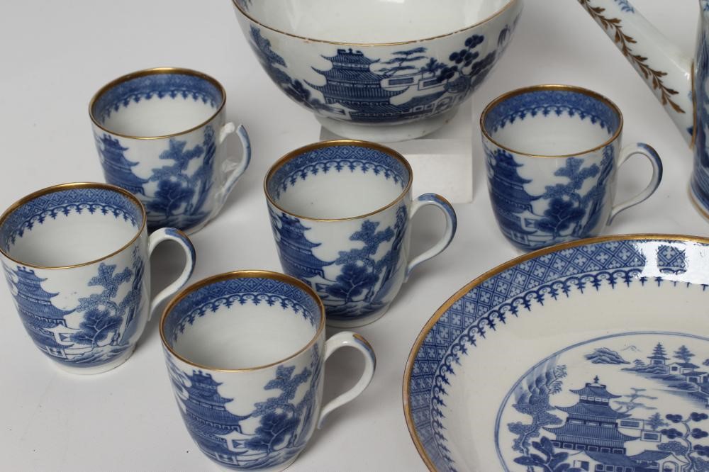AN ENGLISH PORCELAIN PART TEA AND COFFEE SERVICE Image