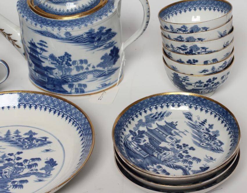 AN ENGLISH PORCELAIN PART TEA AND COFFEE SERVICE Image