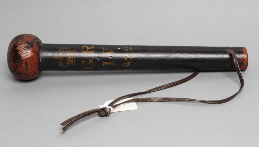 A POLICE TRUNCHEON of knobkerrie form with bulbous head painted in black and red Image