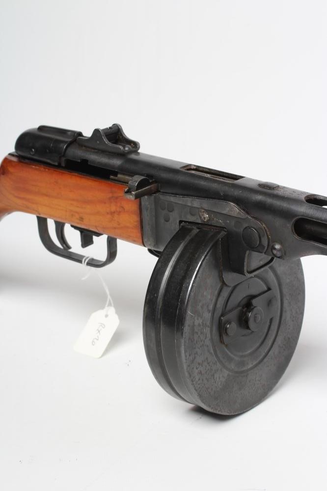 A DEACTIVATED PPSH41 RUSSIAN 7.62MM SUBMACHINE GUN of typical form Image