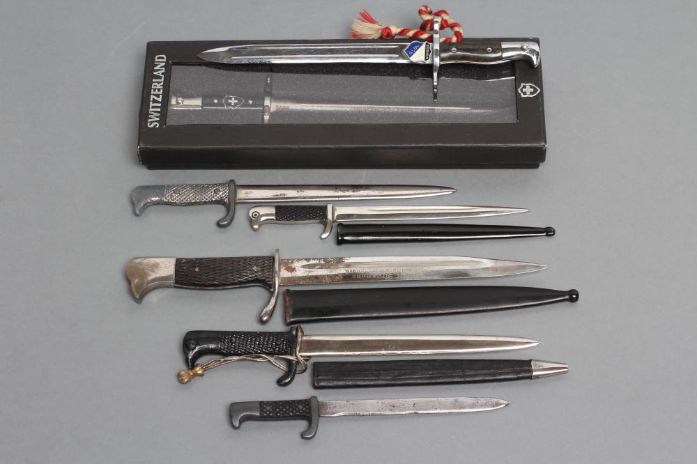 A COLLECTION OF SEVEN MINIATURE BAYONETS Image