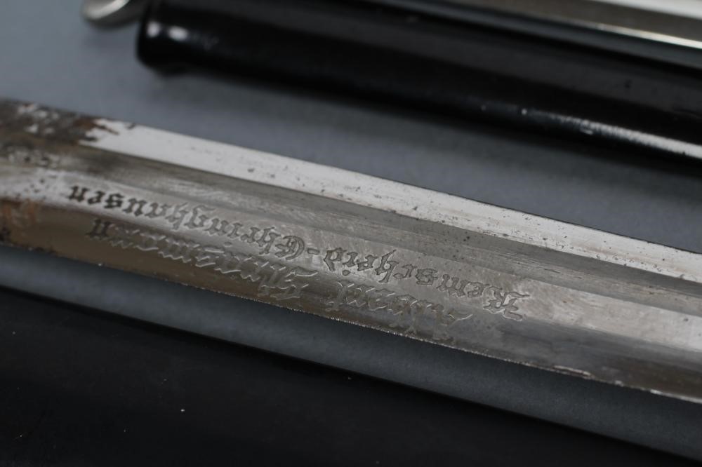 A COLLECTION OF SEVEN MINIATURE BAYONETS Image