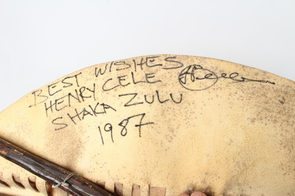 A PAIR OF REPRODUCTION ZULU SHIELD DISPLAYS SIGNED BY ACTOR HENRY CELE Image