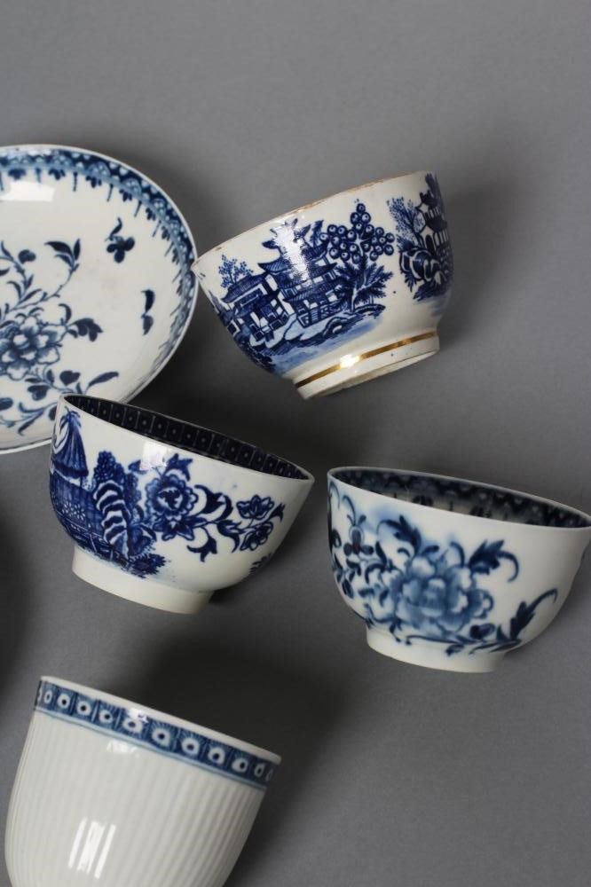 A FIRST PERIOD WORCESTER PORCELAIN FISHERMAN AND CORMORANT TEA BOWL AND SAUCER Image