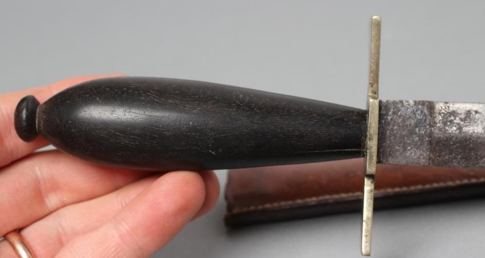 THREE SHEATHED DAGGERS Image